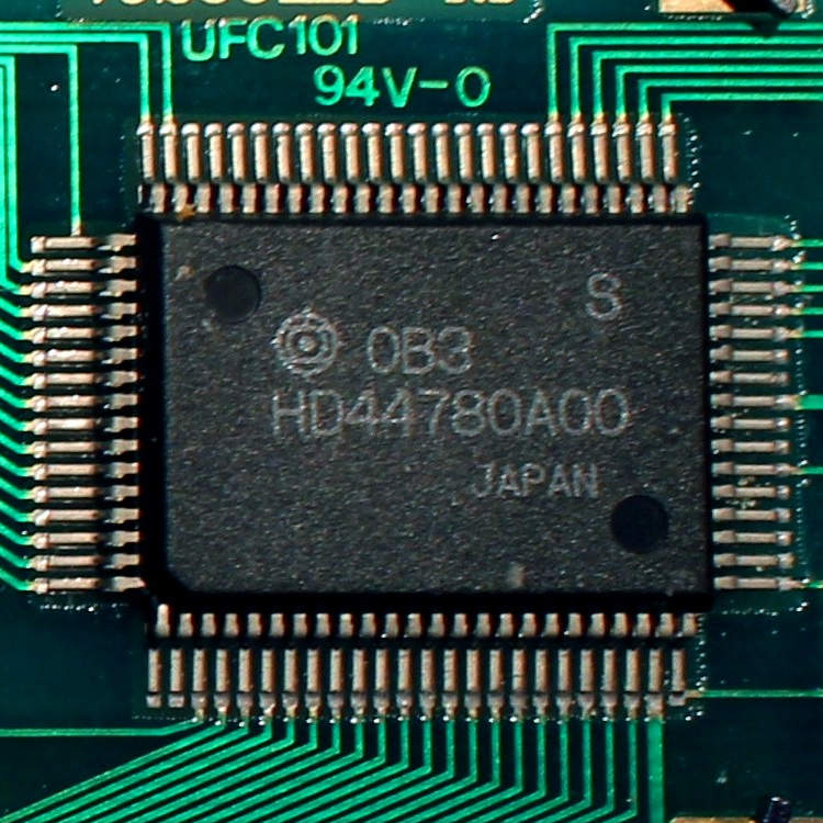 Computer chip showing “HD44780A00” markings