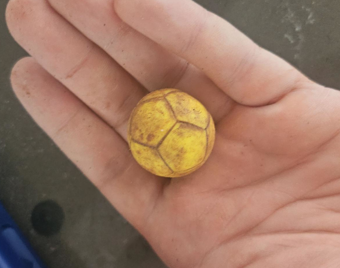 Sanded sphere sitting in my hand